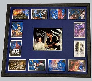 Star Wars Colour Photo Signed by Carrie Fisher & Harrison Ford + 12 Postcards